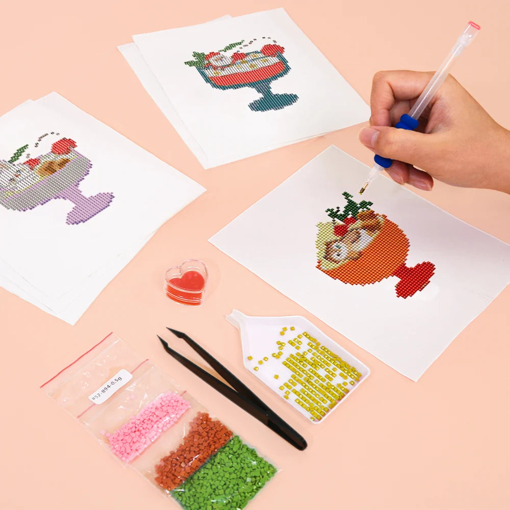 Working on several Christmas Desserts mini diamond painting designs with drills and applicator