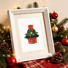 Framed Christmas Pets & Cheer mini diamond painting artwork displayed in a styled setting