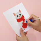 Applying drills to a Christmas Pets & Cheer mini diamond painting design