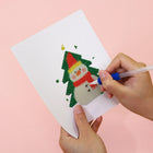 Applying drills to a Christmas Tree Characters mini diamond painting design