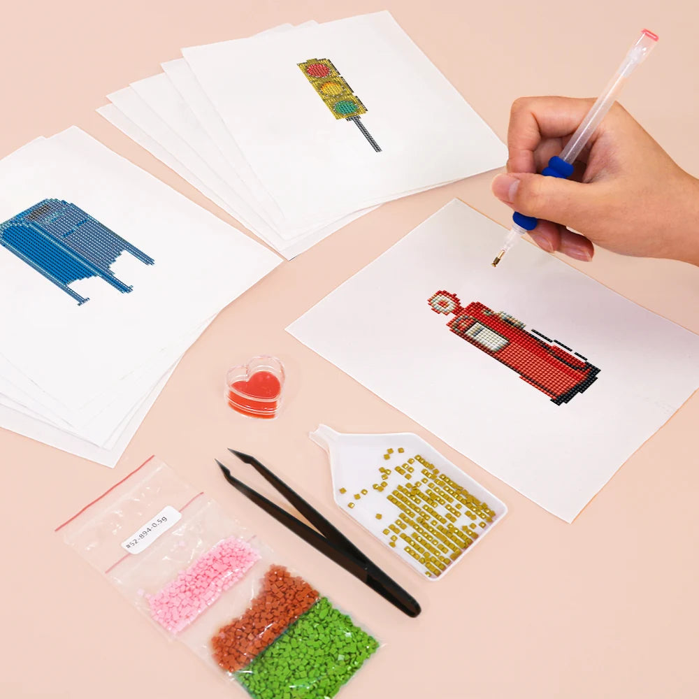 Working on several City Street Icons mini diamond painting designs with drills and applicator