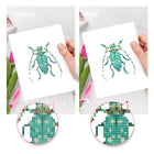 Before and after view of a Colourful Beetles mini diamond painting design