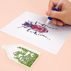 Close-up of drills being placed on a Colourful Beetles mini diamond painting design