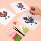 Working on several Colourful Roosters mini diamond painting designs with drills and applicator