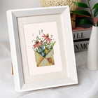 Cottage Garden Teacups mini diamond painting design displayed in a decorative room setting