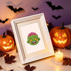 Framed Cute Halloween Monsters mini diamond painting artwork displayed in a styled setting