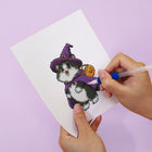 Applying drills to a Cute Halloween Pets mini diamond painting design