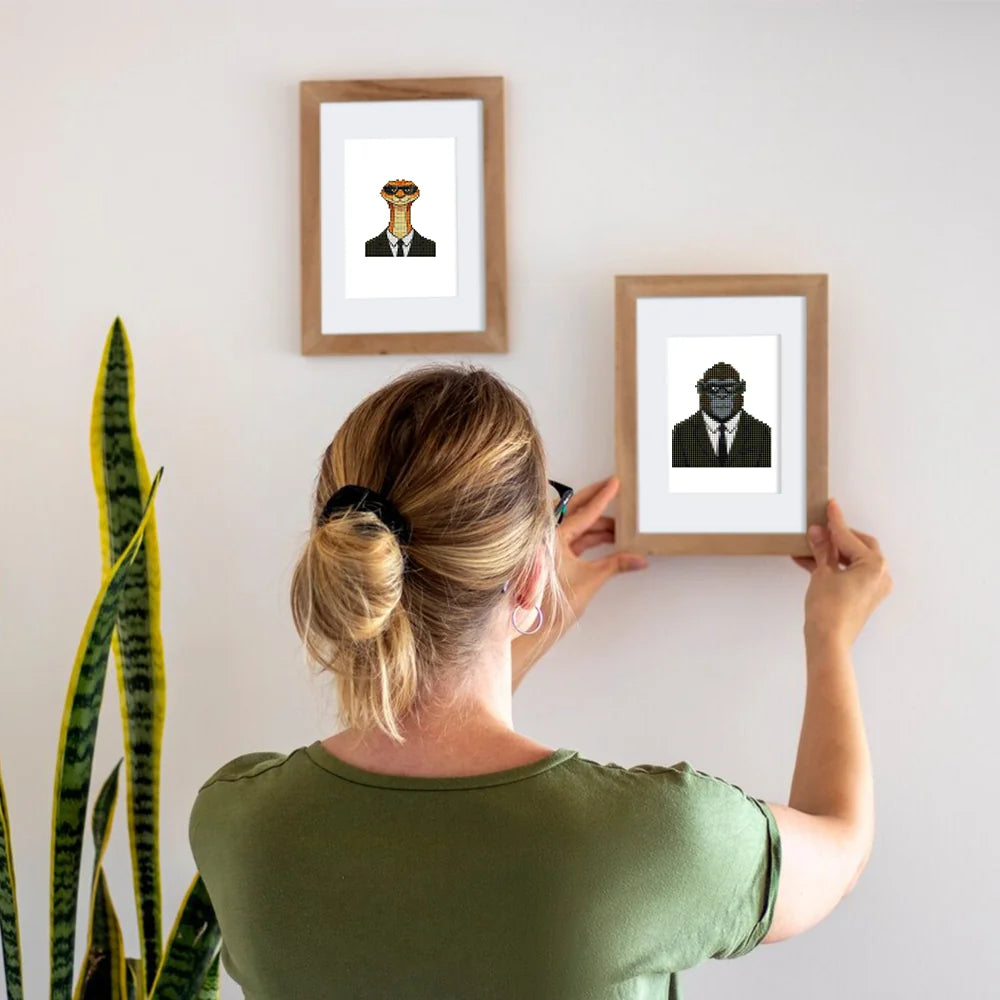 Framed Dapper Animal Gentlemen mini diamond painting artwork displayed in a styled setting
