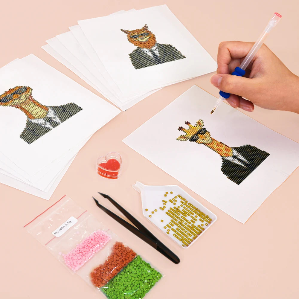 Working on several Dapper Animal Gentlemen mini diamond painting designs with drills and applicator