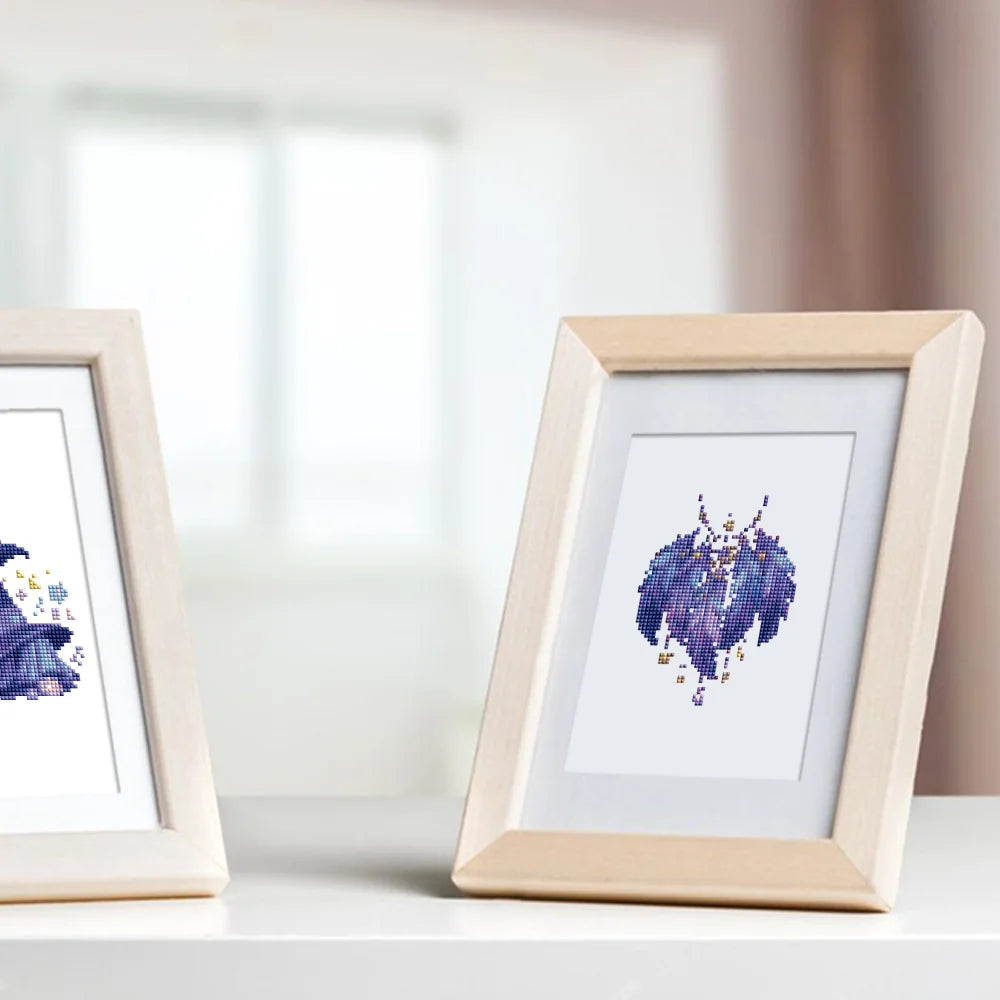 Completed Enchanted Blue Fantasy mini diamond painting shown as framed decor
