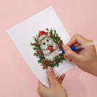 Applying drills to a Festive Woodland Friends mini diamond painting design