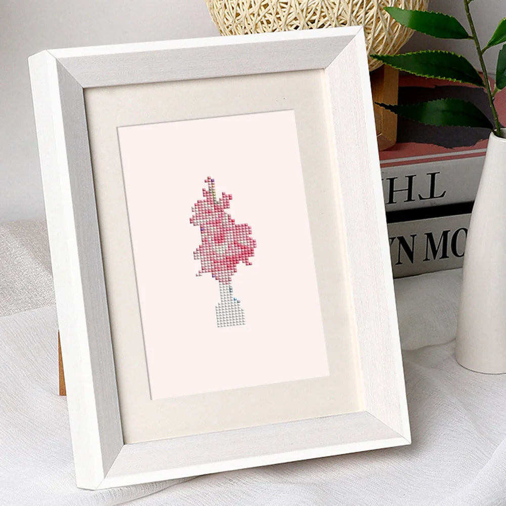 Completed Floral Arrangements mini diamond painting shown as framed decor