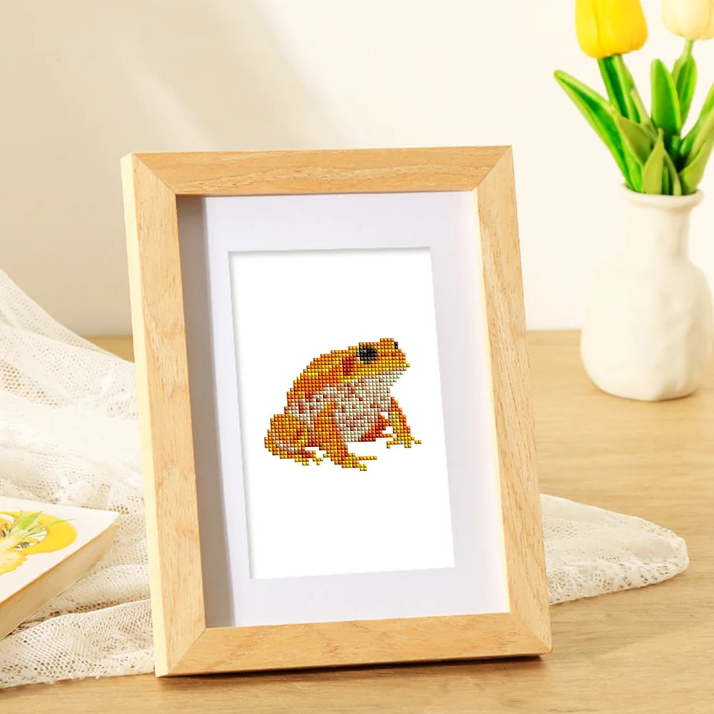 Completed Frogs, Lizards & Chameleons mini diamond painting shown as framed decor