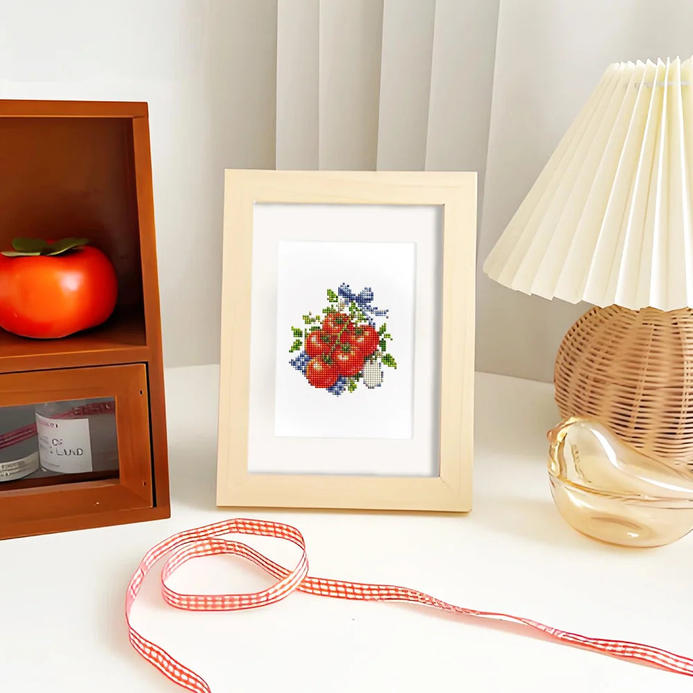 Completed Garden Harvest & Wreaths mini diamond painting shown as framed decor