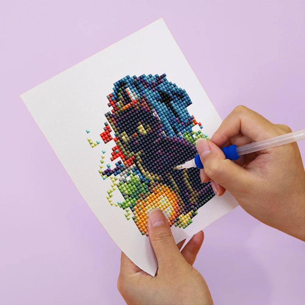 Applying drills to a Gothic Halloween Night mini diamond painting design