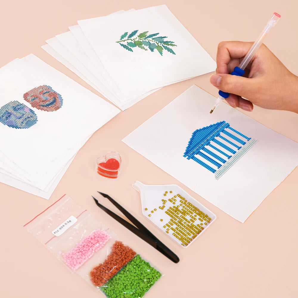 Working on several Greek Island Icons mini diamond painting designs with drills and applicator