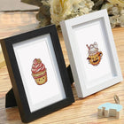Framed Kawaii Cakes & Desserts mini diamond painting artwork displayed in a styled setting