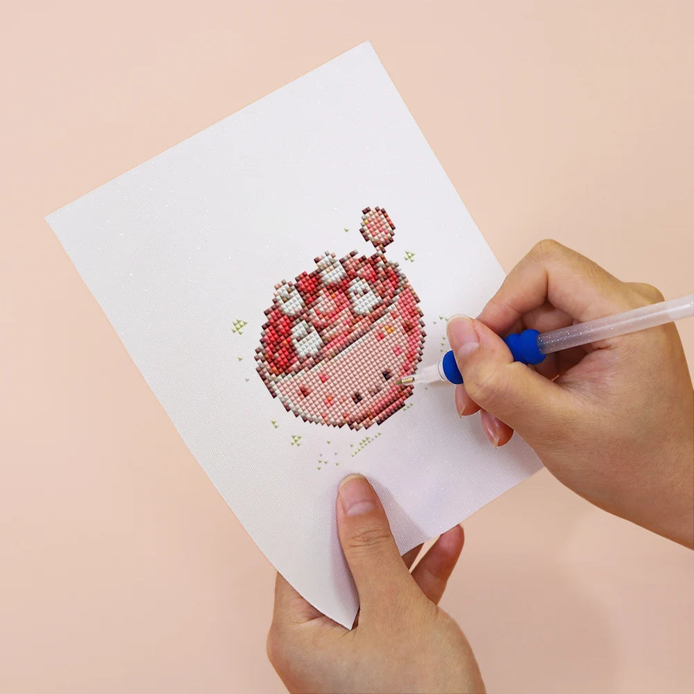 Applying drills to a Kawaii Cakes & Desserts mini diamond painting design