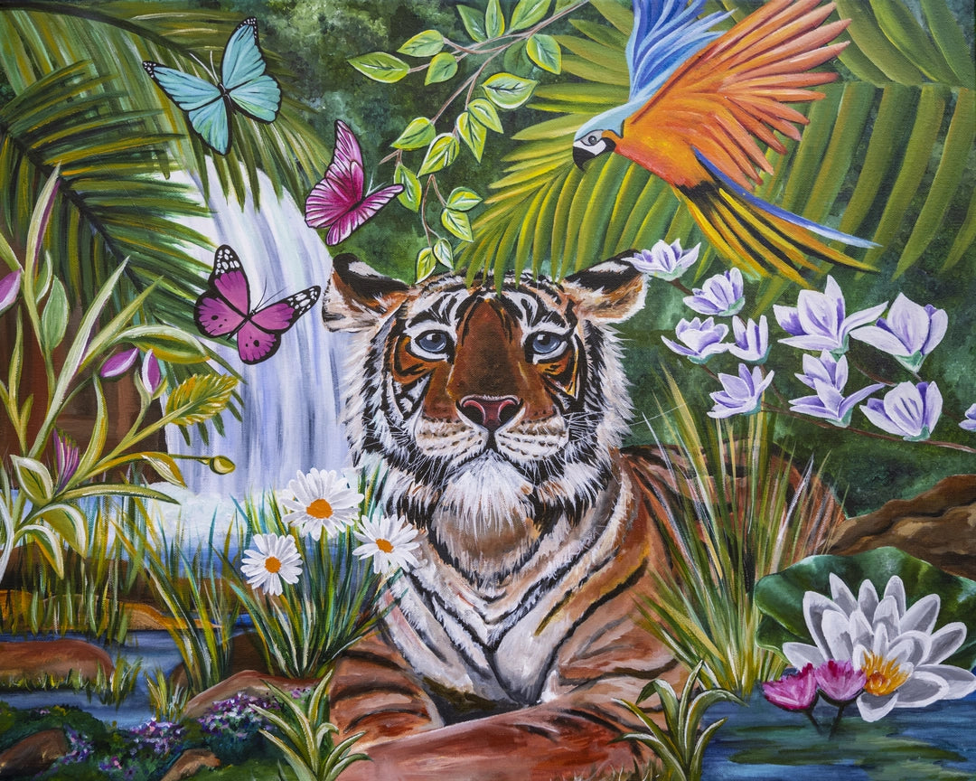 Tiger among tropical flowers and butterflies beside a rainforest waterfall