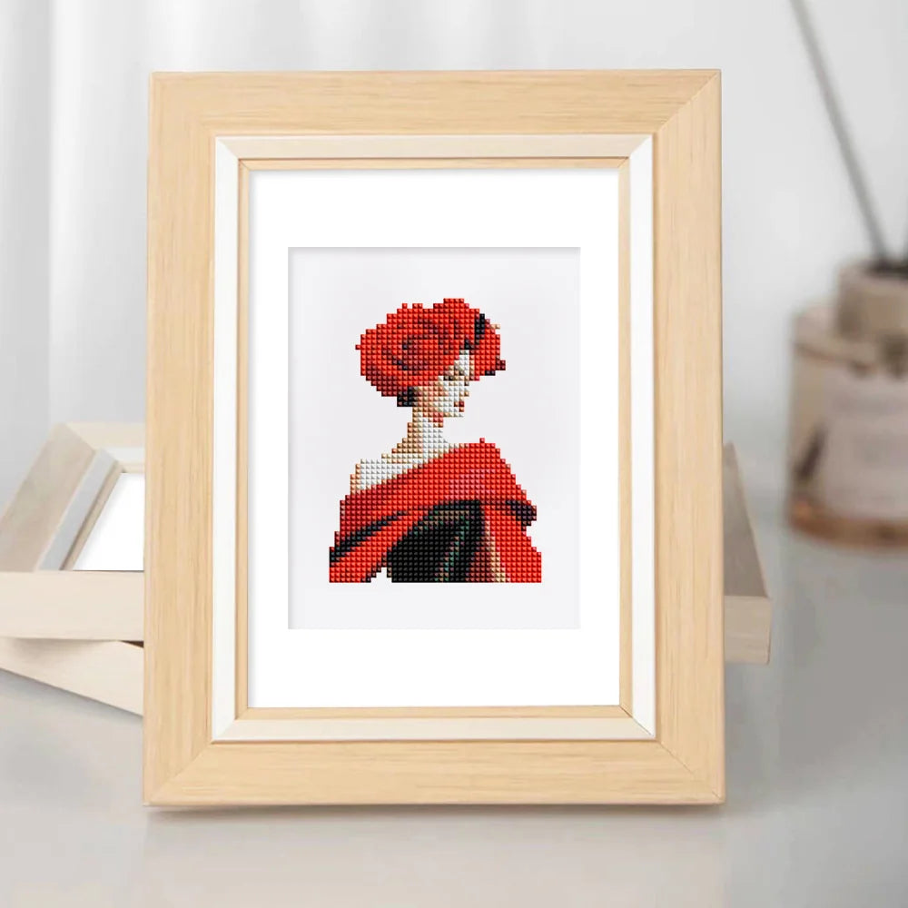 Framed Red Rose Fashion mini diamond painting artwork displayed in a styled setting