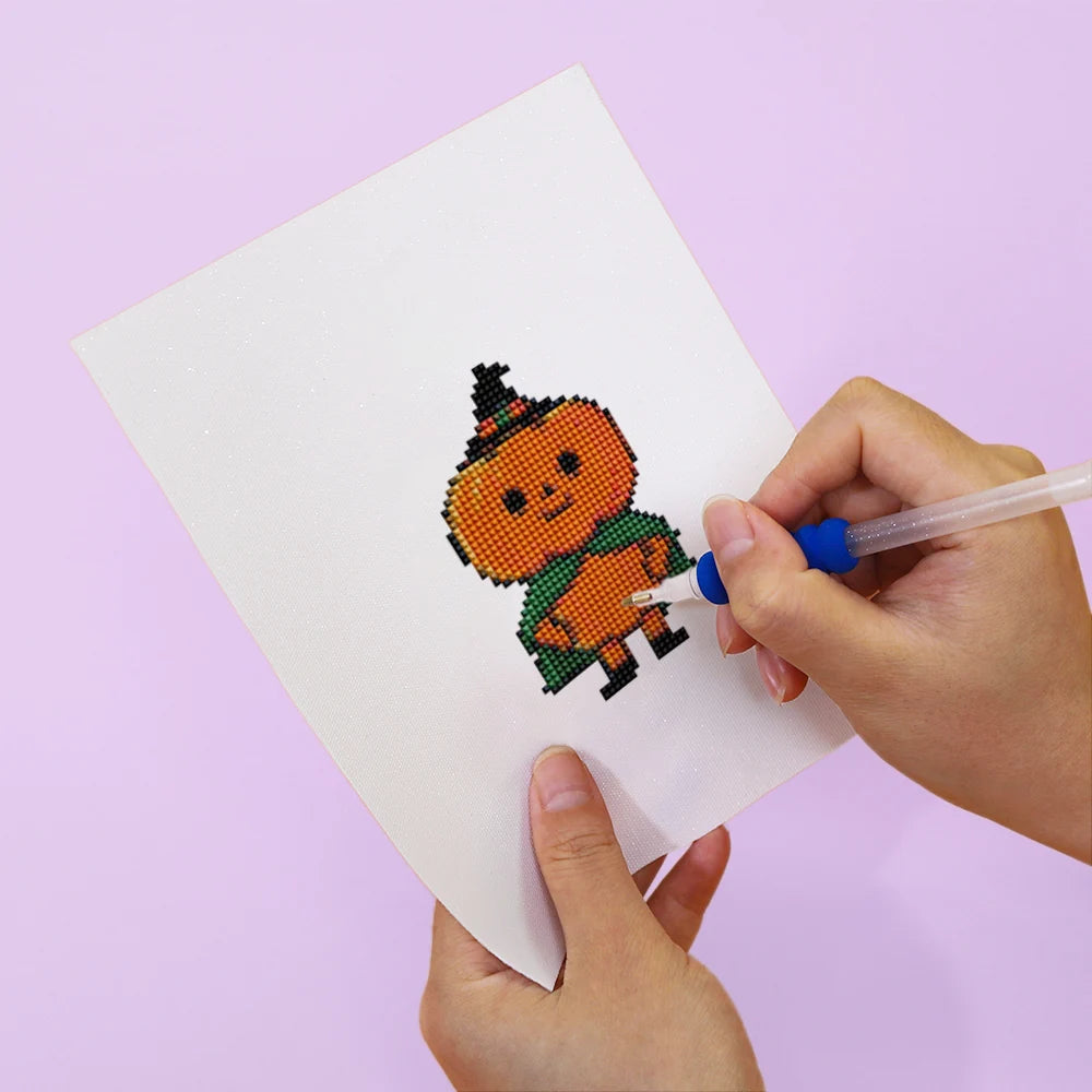 Applying drills to a Spooky Halloween Icons mini diamond painting design