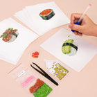 Working on several Sushi Favourites mini diamond painting designs with drills and applicator