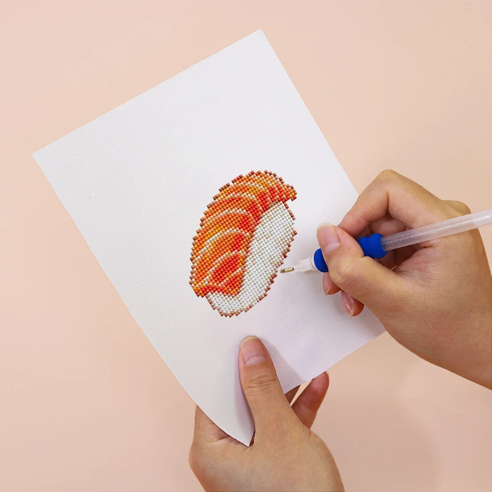 Applying drills to a Sushi Favourites mini diamond painting design