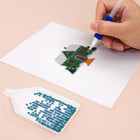 Close-up of drills being placed on a Tiny Village Houses mini diamond painting design