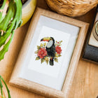 Framed Tropical Birds & Blooms mini diamond painting artwork displayed in a styled setting