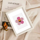 Completed Tropical Blooms & Shells mini diamond painting shown as framed decor