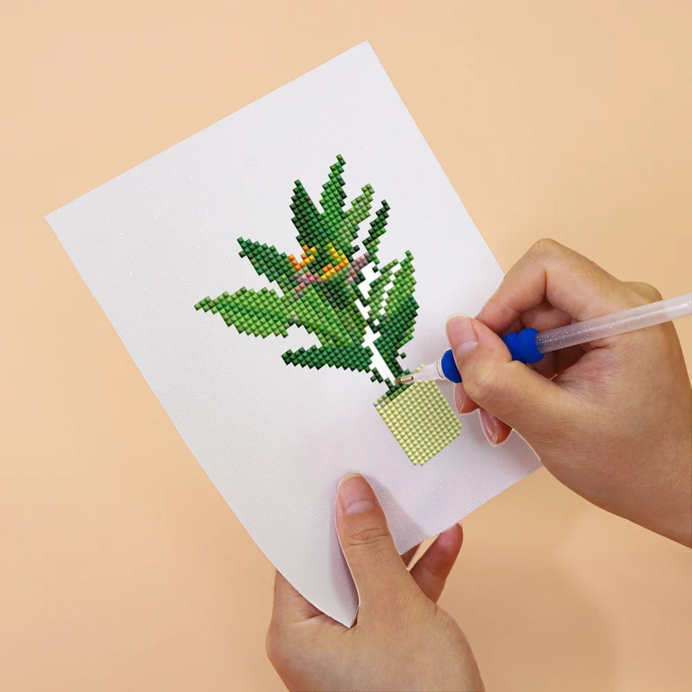 Applying drills to a Tropical Houseplants mini diamond painting design