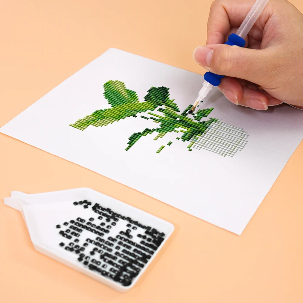Close-up of drills being placed on a Tropical Houseplants mini diamond painting design
