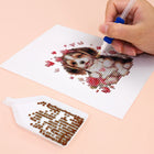 Close-up of drills being placed on a Valentine Pets mini diamond painting design