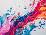 Pink, blue and turquoise paint splashes with orange accents and scattered droplets on white
