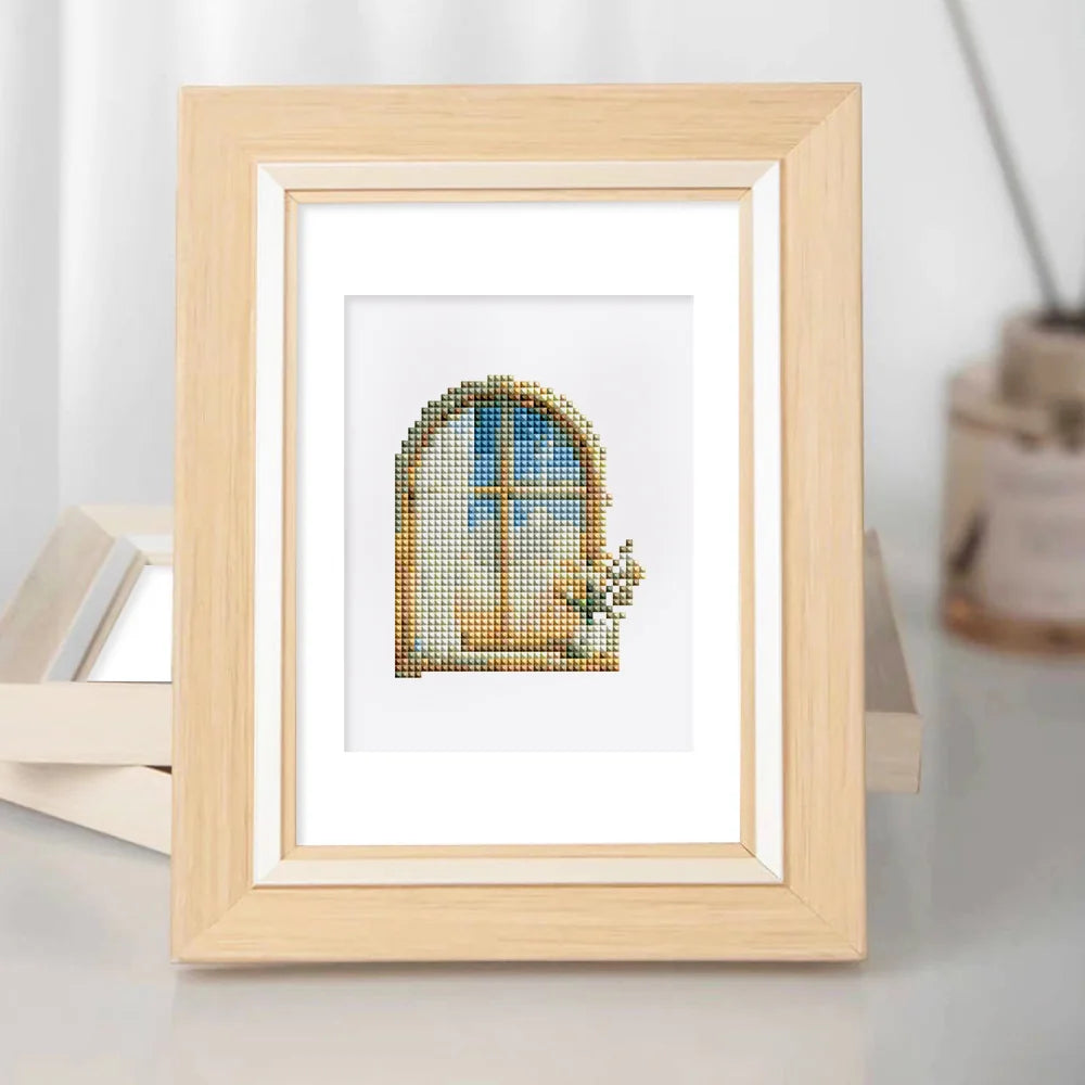 Framed Whimsical Cottage Finds mini diamond painting artwork displayed in a styled setting