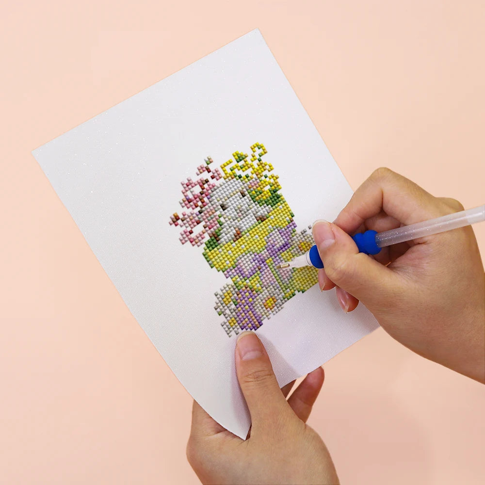 Applying drills to a Whimsical Woodland Friends mini diamond painting design