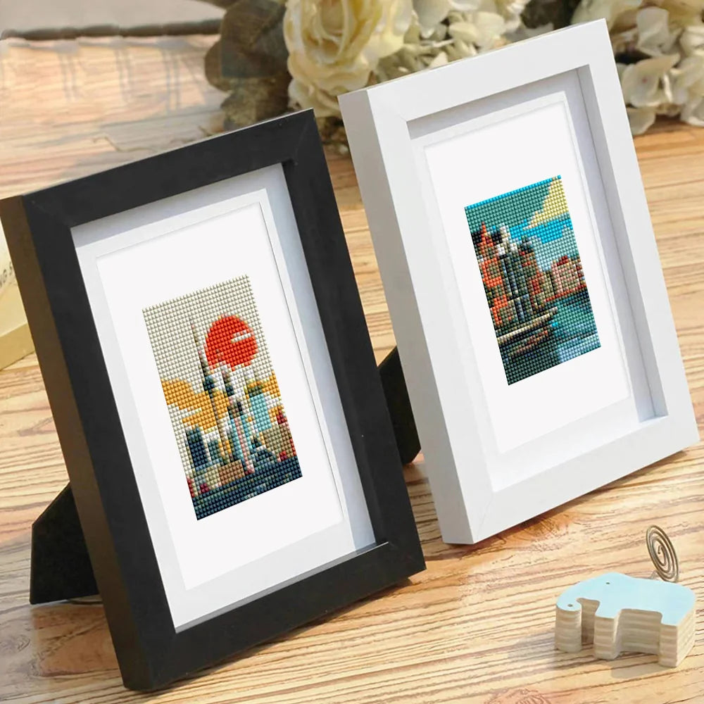 Completed World Landmarks mini diamond painting shown as framed decor